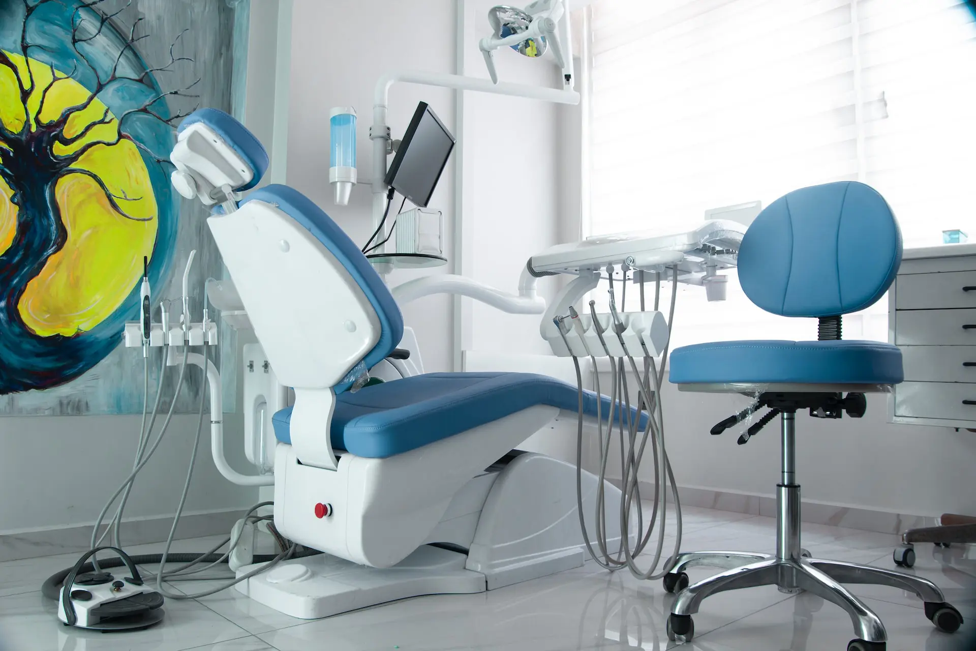 How Often Should Seniors Go to the Dentist - blue dentist chair